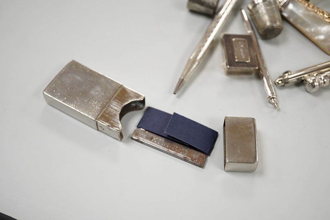 A Victorian silver vinaigrette, Edward Smith, Birmingham, 1848, 27mm, a collection of thimbles including some silver and sundry other items including pencils, child's rattle, button hooks, silver pocket watch, silver Ala